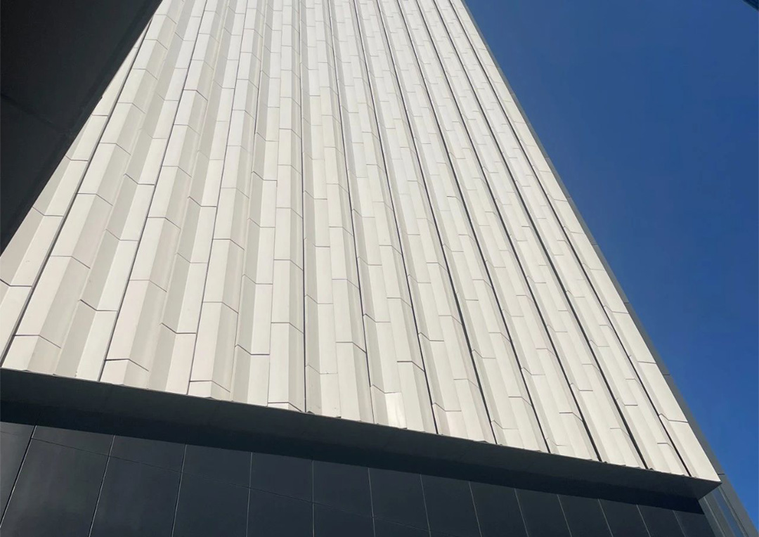 An elegant facade design at Suzhou China World Trade Center, combining LOPO Terracotta panels with natural marble for a timeless aesthetic.