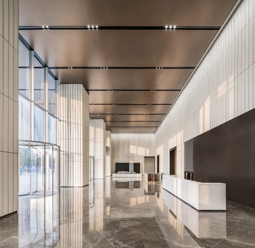 Spacious and elegant depth view of the Vanke Metropolis office lobby