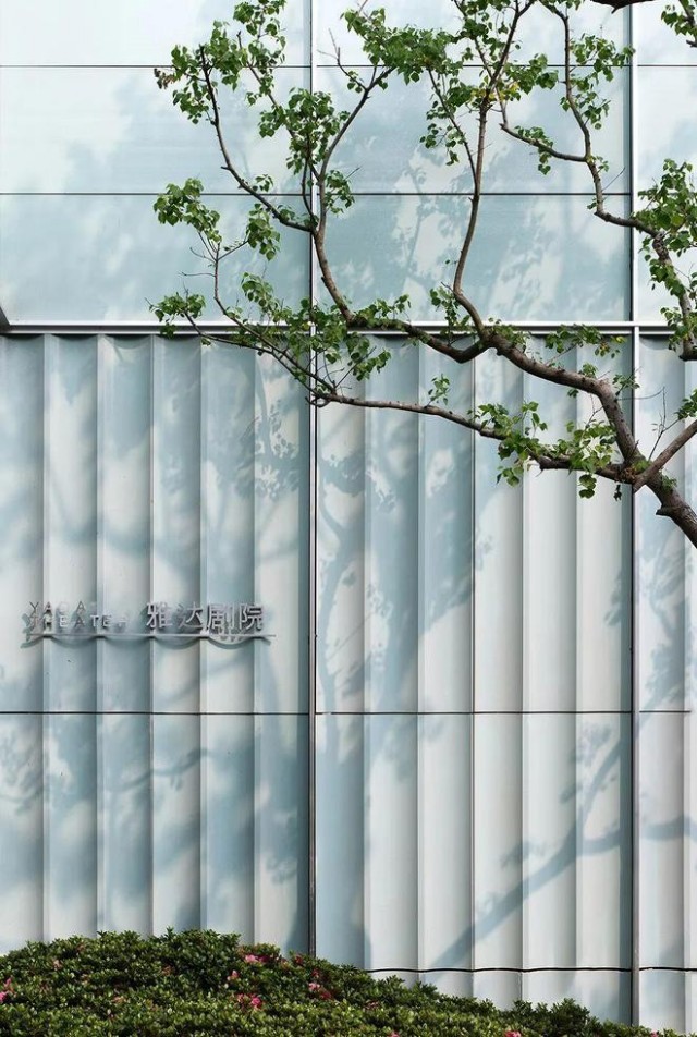 Close-up view of terracotta panels at Yada Theatre.