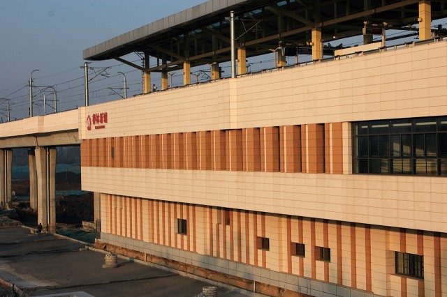 Indonesian train station facade with durable LOPO Terracotta Panels, enhancing energy efficiency and aesthetics.