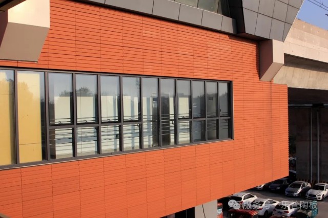 Close-up of LOPO Terracotta Cladding used in modern Indonesian transport hub architecture.